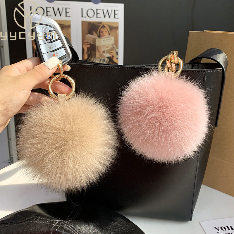 Luxury Bags Yellow - LLavero de pompones con bolas de